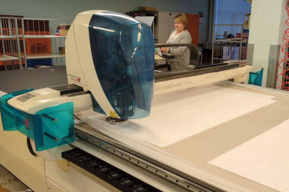 Automatic fabric cutter in action